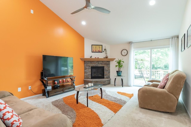 2501 Holiday House Rd, Saint Joseph, MI 49085 - carpeted living room featuring vaulted ceiling, a stone fireplace, ceiling fan, and recessed lighting