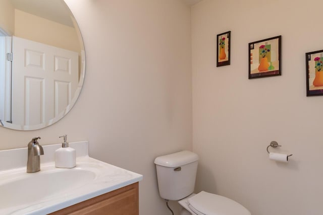 2501 Holiday House Rd, Saint Joseph, MI 49085 - half bathroom with vanity and toilet