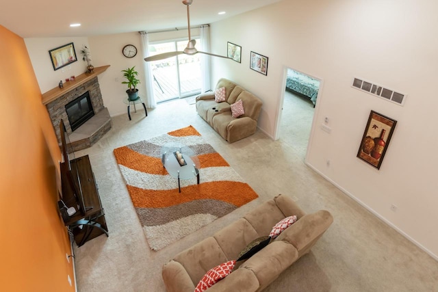 2501 Holiday House Rd, Saint Joseph, MI 49085 - carpeted living area featuring a fireplace, recessed lighting, and baseboards