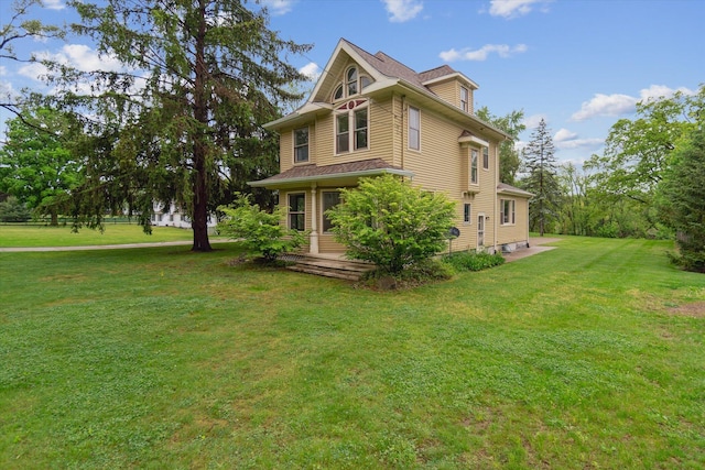 904 Schuring Rd, Portage, MI 49024 - view of home's exterior featuring a yard