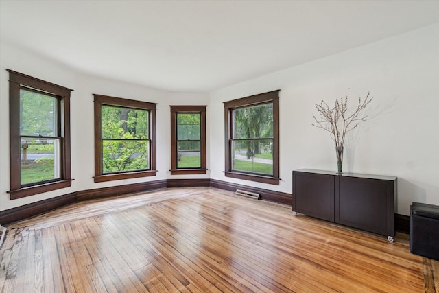904 Schuring Rd, Portage, MI 49024 - spare room featuring healthy amount of natural light, light wood-style floors, and baseboards