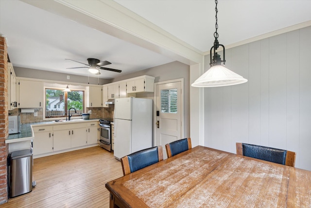 904 Schuring Rd, Portage, MI 49024 - dining space with ceiling fan and light wood-type flooring