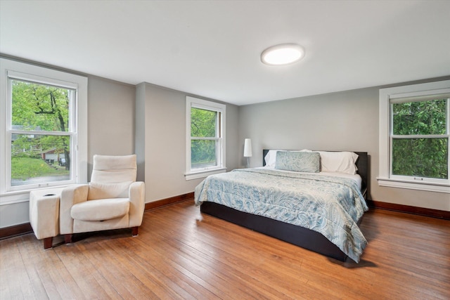904 Schuring Rd, Portage, MI 49024 - bedroom featuring hardwood / wood-style flooring and baseboards