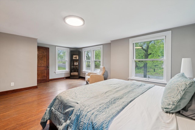 904 Schuring Rd, Portage, MI 49024 - bedroom with wood finished floors and baseboards