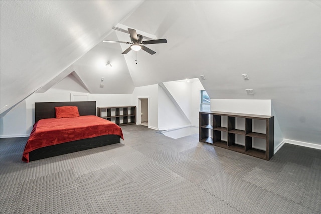 904 Schuring Rd, Portage, MI 49024 - bedroom with vaulted ceiling, carpet flooring, baseboards, and a ceiling fan