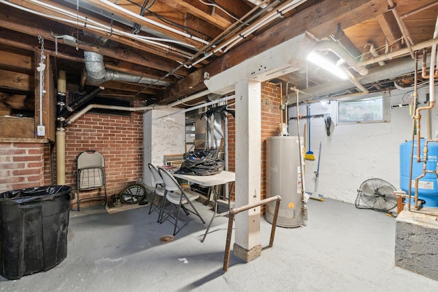 904 Schuring Rd, Portage, MI 49024 - below grade area featuring water heater and a water pressure tank