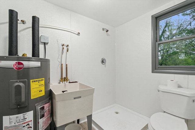 904 Schuring Rd, Portage, MI 49024 - full bath featuring water heater, toilet, a shower stall, and a sink