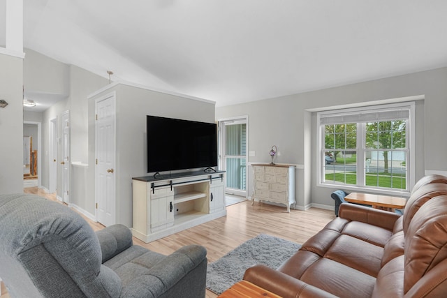 121 W Calgary Dr, Hastings, MI 49058 - living room featuring light wood-style floors and baseboards