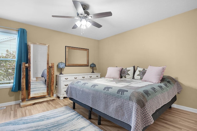 121 W Calgary Dr, Hastings, MI 49058 - bedroom with light wood-style floors, baseboards, and ceiling fan