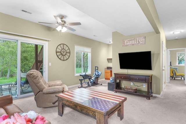 121 W Calgary Dr, Hastings, MI 49058 - living room with carpet, ceiling fan, and baseboards