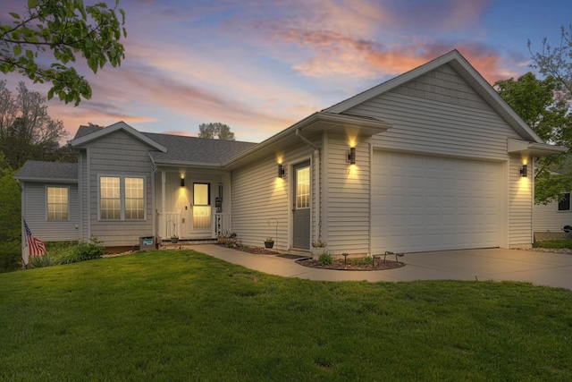 121 W Calgary Dr, Hastings, MI 49058 - ranch-style house featuring driveway, an attached garage, and a yard