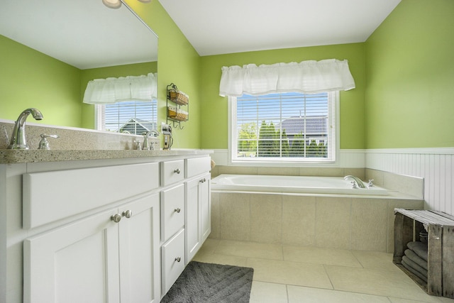 1001 Goodsell St, Otsego, MI 49078 - full bath featuring a bath, tile patterned floors, and vanity
