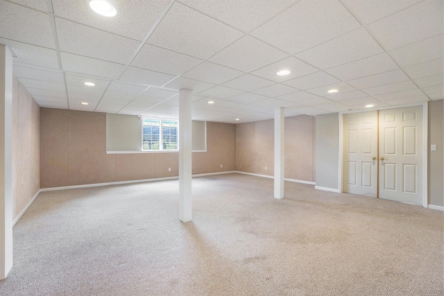 1001 Goodsell St, Otsego, MI 49078 - below grade area with carpet flooring, a paneled ceiling, recessed lighting, and baseboards