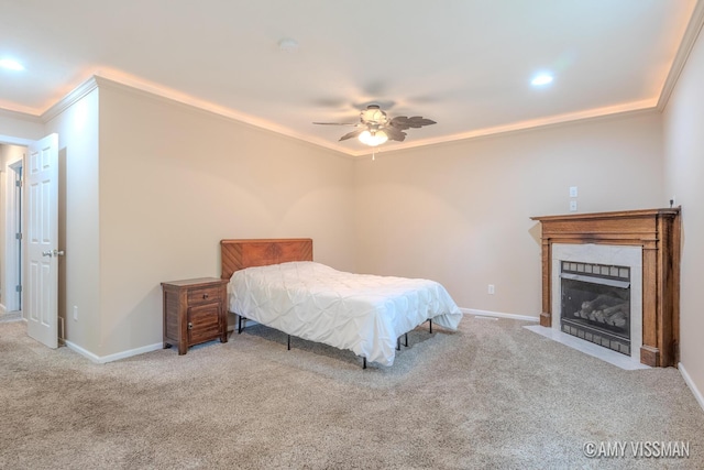4175 Huntington Ave NE, Grand Rapids, MI 49525 - bedroom with ornamental molding, carpet, a fireplace with flush hearth, baseboards, and a ceiling fan