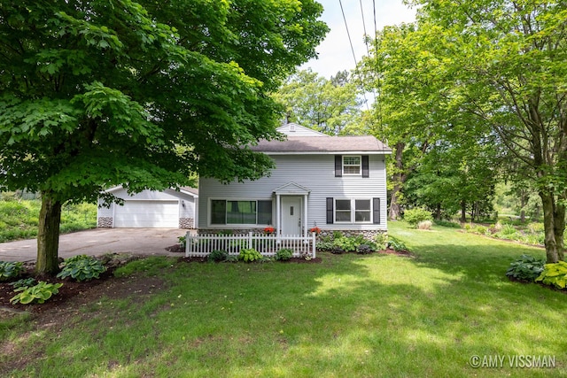 4175 Huntington Ave NE, Grand Rapids, MI 49525 - view of front facade featuring a front yard, covered porch, and a garage