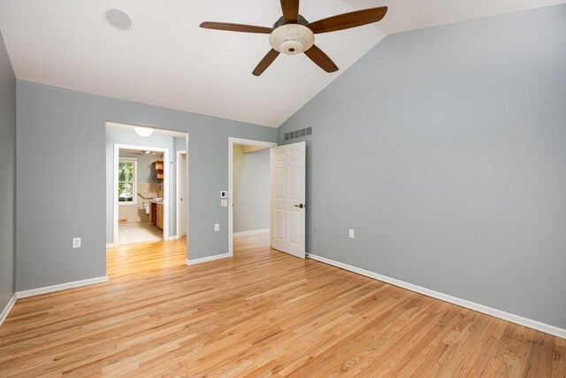 4936 Ravine Ct, Ann Arbor, MI 48105 - unfurnished bedroom featuring vaulted ceiling, light wood finished floors, baseboards, ensuite bathroom, and a ceiling fan
