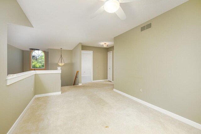 4936 Ravine Ct, Ann Arbor, MI 48105 - unfurnished room with carpet floors, baseboards, and a ceiling fan