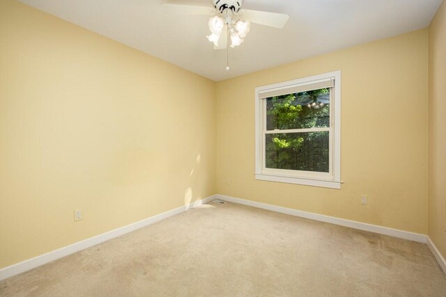 4936 Ravine Ct, Ann Arbor, MI 48105 - unfurnished room with light colored carpet, baseboards, and ceiling fan