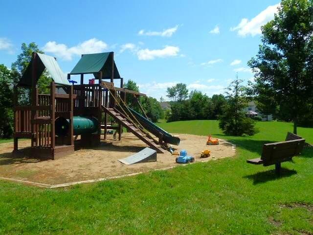 4936 Ravine Ct, Ann Arbor, MI 48105 - view of jungle gym featuring a yard and heating fuel