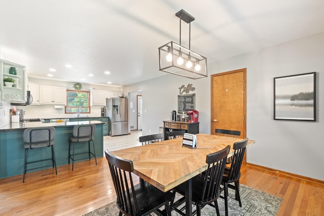 617 Ramsey Ln, Pleasant Lake, MI 49272 - dining room with light wood finished floors, recessed lighting, and baseboards