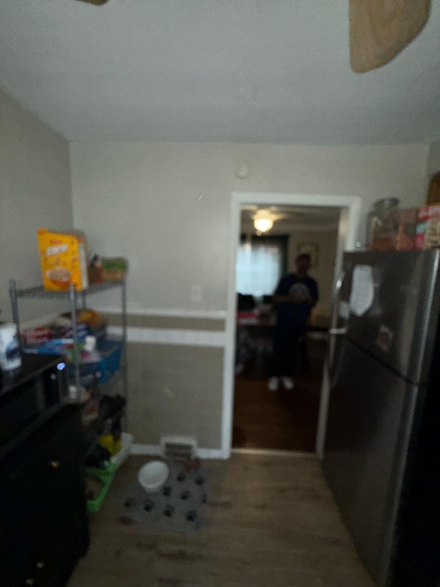 16510 Oakfield Ave, Detroit, MI 48235 - kitchen with freestanding refrigerator and wood finished floors