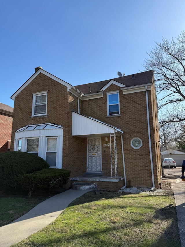 18294 Marlowe St, Detroit, MI 48235 - multi unit property with brick siding and a front yard