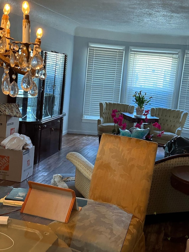 18294 Marlowe St, Detroit, MI 48235 - dining area with wood finished floors, baseboards, and a textured ceiling