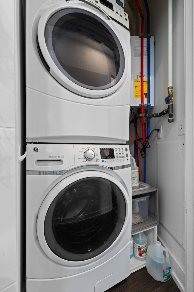 211 W Kingsley St, Ann Arbor, MI 48103 - washroom with estacked washer and dryer and tankless water heater