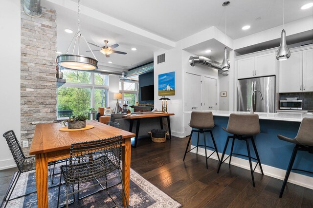 211 W Kingsley St, Ann Arbor, MI 48103 - dining room with dark wood finished floors, recessed lighting, a ceiling fan, and baseboards