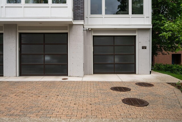 211 W Kingsley St, Ann Arbor, MI 48103 - garage featuring decorative driveway