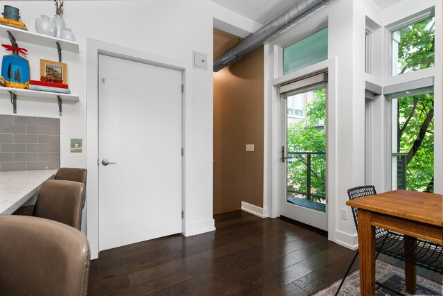 211 W Kingsley St, Ann Arbor, MI 48103 - home office featuring dark wood-style flooring