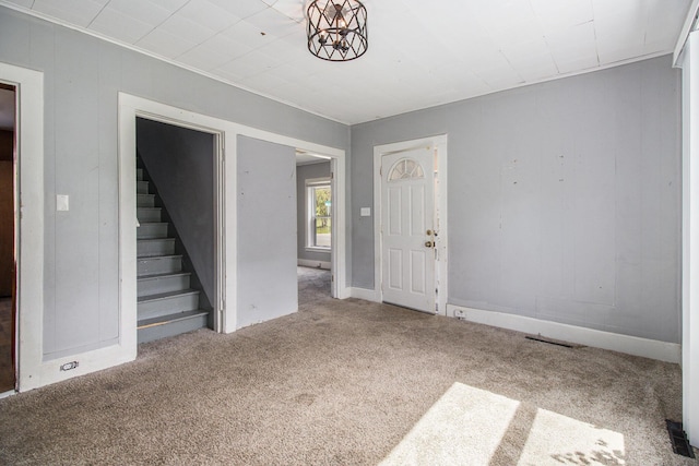 527 Jackson St W, Battle Creek, MI 49037 - carpeted foyer featuring stairway