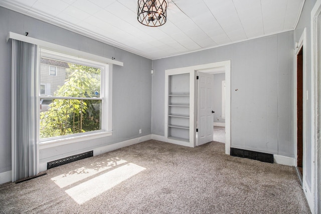 527 Jackson St W, Battle Creek, MI 49037 - unfurnished bedroom with carpet flooring and baseboards
