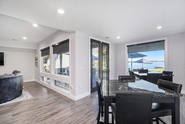 104 Highview Ct, Brooklyn, MI 49230 - dining room featuring wood finished floors, baseboards, and recessed lighting