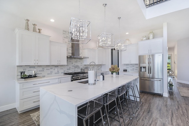 104 Highview Ct, Brooklyn, MI 49230 - kitchen with stainless steel appliances, a chandelier, baseboards, tasteful backsplash, and white cabinetry