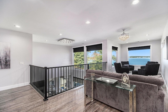 104 Highview Ct, Brooklyn, MI 49230 - living area featuring recessed lighting, wood finished floors, healthy amount of natural light, and baseboards