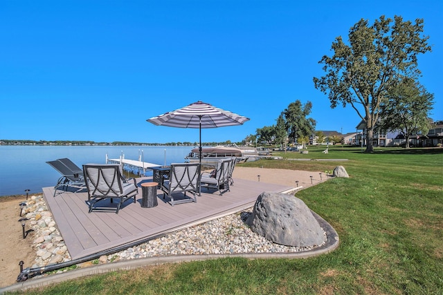104 Highview Ct, Brooklyn, MI 49230 - wooden terrace with a lawn, a water view, and a boat dock