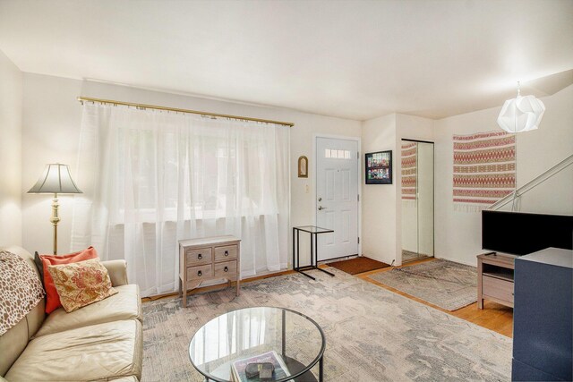 3146 Wolverine Dr, Ann Arbor, MI 48108 - living room with wood finished floors