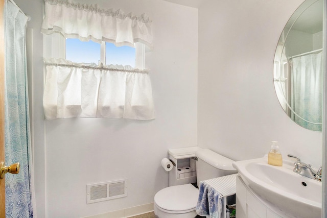 3146 Wolverine Dr, Ann Arbor, MI 48108 - full bathroom featuring toilet, vanity, and baseboards