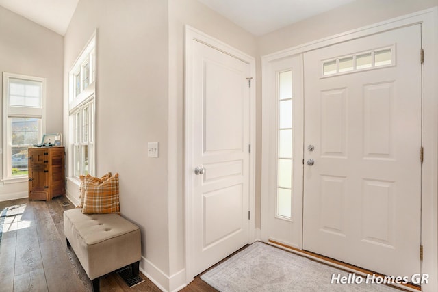 535 N Creek Ct NE, Rockford, MI 49341 - foyer entrance featuring hardwood / wood-style floors and baseboards