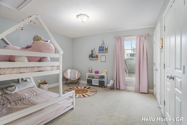 535 N Creek Ct NE, Rockford, MI 49341 - bedroom with carpet flooring and baseboards