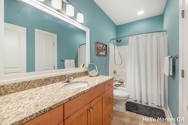535 N Creek Ct NE, Rockford, MI 49341 - bathroom featuring vanity, tile patterned flooring, shower / bath combo, and toilet