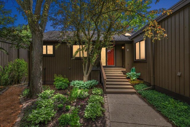 2 Eastbury Ct, Ann Arbor, MI 48105 - doorway to property with a shingled roof