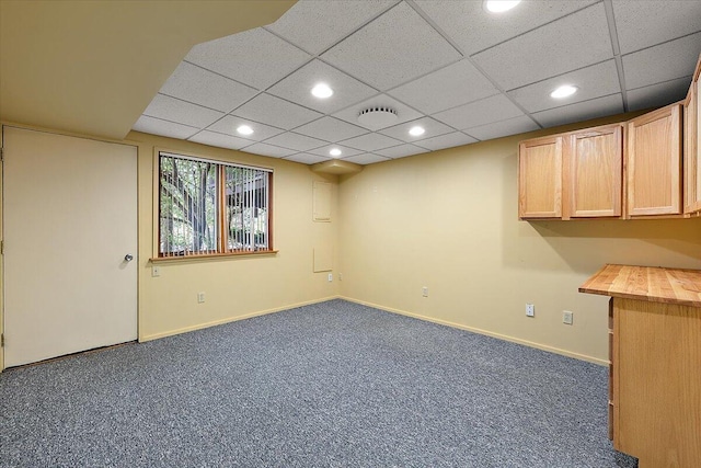 2 Eastbury Ct, Ann Arbor, MI 48105 - basement with recessed lighting, dark colored carpet, baseboards, and a paneled ceiling