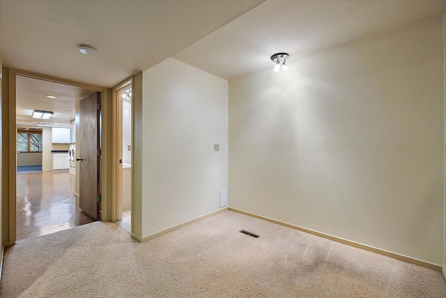 2 Eastbury Ct, Ann Arbor, MI 48105 - spare room with carpet, baseboards, and a smoke detector