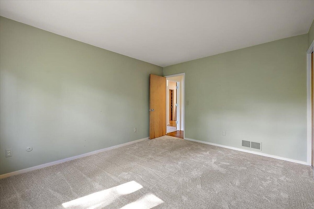 2 Eastbury Ct, Ann Arbor, MI 48105 - carpeted spare room featuring baseboards