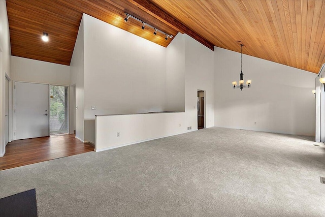 2 Eastbury Ct, Ann Arbor, MI 48105 - unfurnished living room with wooden ceiling, carpet, a chandelier, high vaulted ceiling, and rail lighting