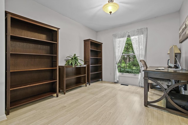 14436 Fairway St, Livonia, MI 48154 - office with light wood-type flooring and baseboards