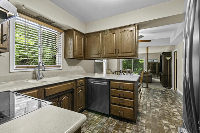14436 Fairway St, Livonia, MI 48154 - kitchen featuring stainless steel appliances, a sink, ceiling fan, and healthy amount of natural light