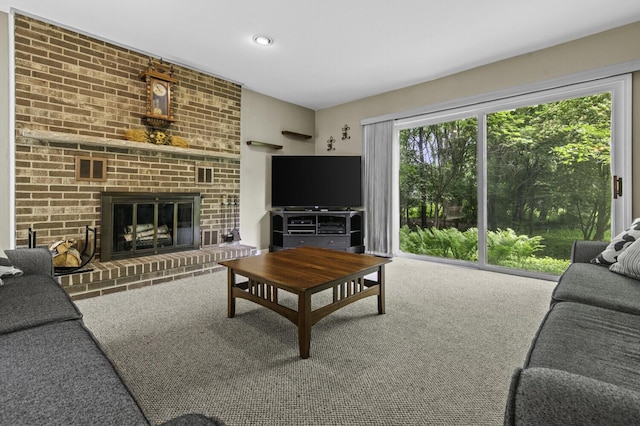 14436 Fairway St, Livonia, MI 48154 - living room featuring carpet, a brick fireplace, and recessed lighting
